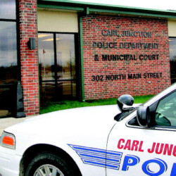 carl junction police cruiser in front of police department building