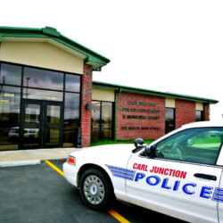 carl junction police cruiser in front of police department building